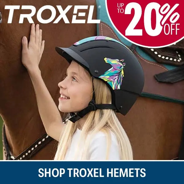 A young girl wearing a black Troxel equestrian helmet with a colorful horse graphic, posing with a brown horse. The image includes promotional text overlays: 'TROXEL' at the top left, a red circular badge reading 'UP TO 20% OFF', and a blue banner at the bottom reading 'SHOP TROXEL HEMETS'.